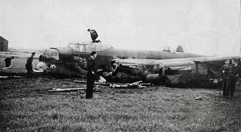 A crashed Lancaster on an RAF airfield