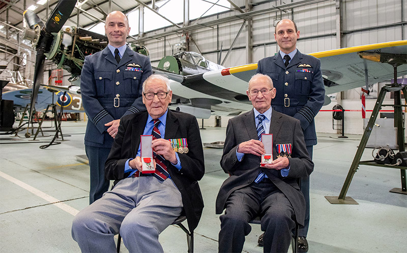 RAF Lancaster Air Gunner Bert Hammond and Army Signaller Harry Archer with D-Day veteran Spitfire Mk Vb AB910