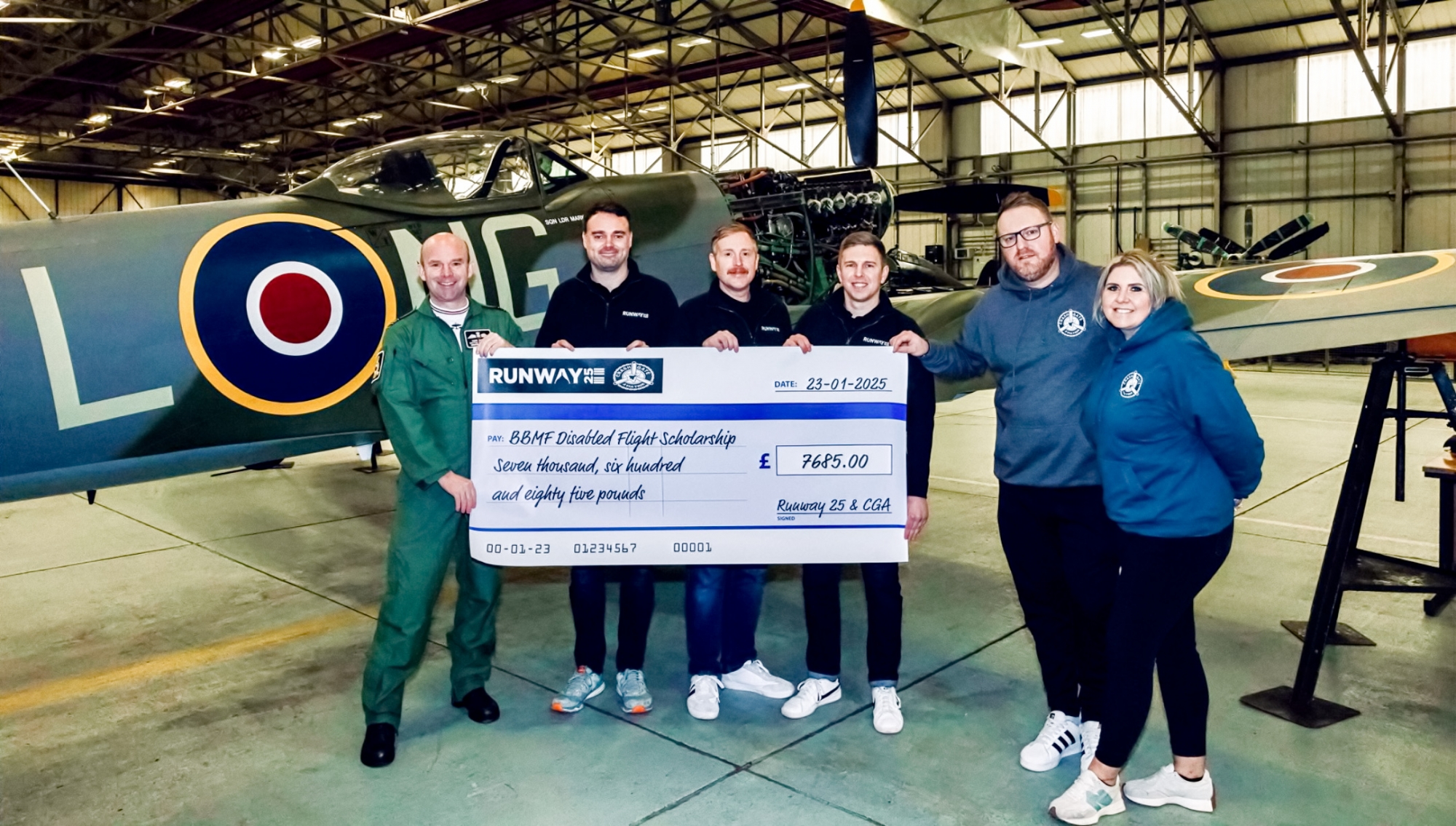 Cheque handover Mark Long patch