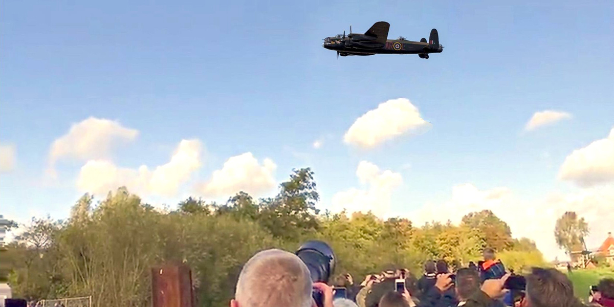 BBMF Lancaster PA474 flies over the recovery site of Lancaster R5682